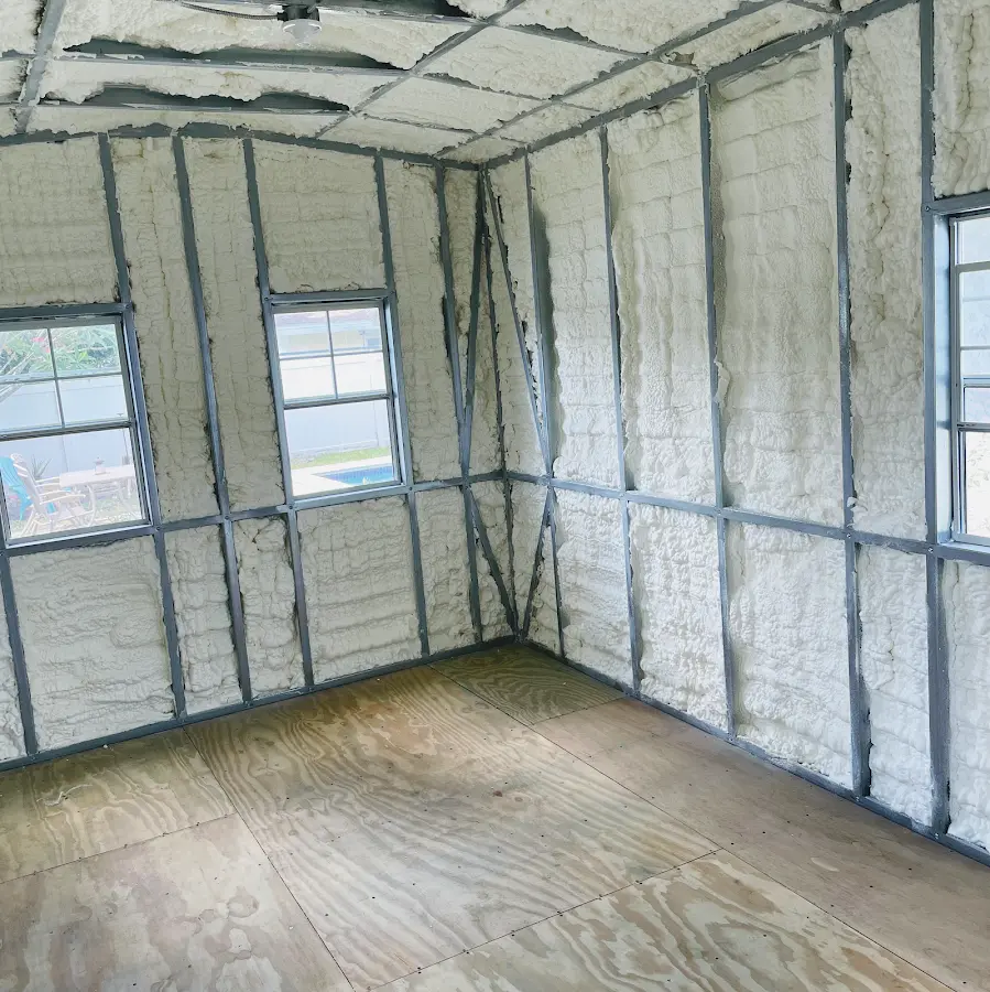 Closed-cell spray foam insulation applied to wall cavities in a residential project in Lihue